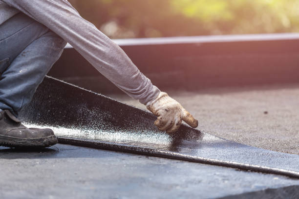 Professional Waterproofing technician working in Lambertville, MI